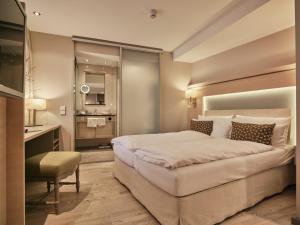 Ein Bett oder Betten in einem Zimmer der Unterkunft Hotel Reppert