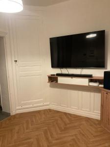 TV a/nebo společenská místnost v ubytování Appartement agréable et fonctionnel