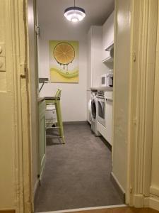 Kuchyň nebo kuchyňský kout v ubytování Appartement agréable et fonctionnel