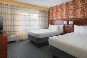 Voodi või voodid majutusasutuse Courtyard by Marriott Mt. Laurel toas