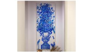 a blue and white vase on a wall at Villa Olimpia in Mondello