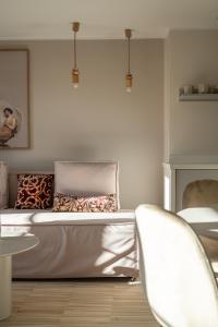 a bedroom with a bed and a fireplace at RentPlanet - Apartamenty Rynek in Wrocław