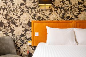 Letto o letti in una camera di Mercure Livingston Hotel
