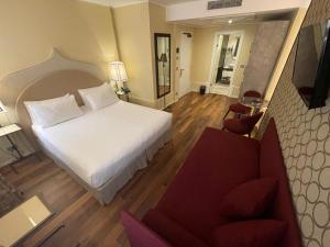 Posteľ alebo postele v izbe v ubytovaní Albergo San Marco