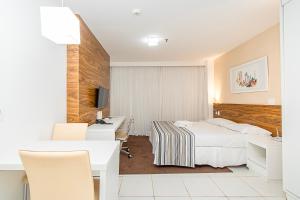 Giường trong phòng chung tại Vision Hotel em Brasília 85145