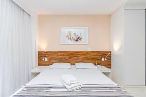 Giường trong phòng chung tại Vision Hotel em Brasília 85145