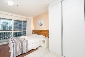 Giường trong phòng chung tại Vision Hotel em Brasília 85145 +24 ảnh