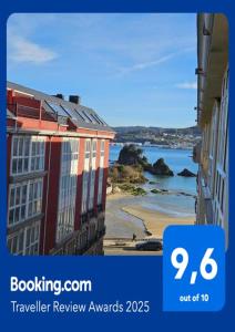 a picture of a view of a beach and buildings at Los Castelos by Urraca Suites Viveiro in Viveiro