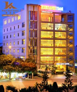 a building with lights on in a city at night at Kieu Anh Hotel Vung Tau in Vung Tau