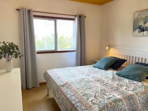 Postel nebo postele na pokoji v ubytování Casa Caro, Las Norias