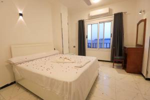 Ένα ή περισσότερα κρεβάτια σε δωμάτιο στο Villa Abo Tarek +64 φωτογραφίες