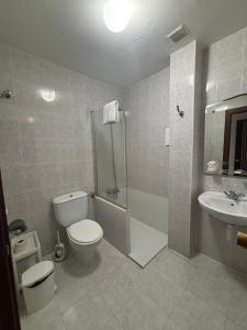 Koupelna v ubytování Hostal Legaz