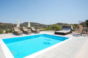 Πισίνα στο ή κοντά στο Escape In View Villa Rhodes