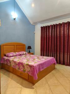 Ένα ή περισσότερα κρεβάτια σε δωμάτιο στο Blue Star Villa