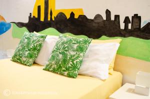 Ένα ή περισσότερα κρεβάτια σε δωμάτιο στο Il Rifugio dell'artista