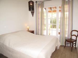 Postel nebo postele na pokoji v ubytování Holiday Home Breguieres by Interhome