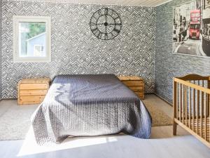 Postel nebo postele na pokoji v ubytování Holiday Home Huvila 22 by Interhome