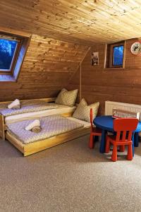 Postel nebo postele na pokoji v ubytování Chalet Studenec by Interhome
