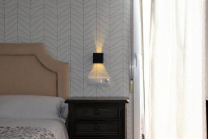 Postel nebo postele na pokoji v ubytování Apartamentos Ronda Luz