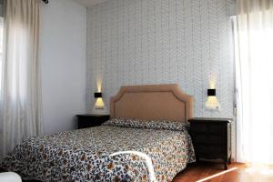 Postel nebo postele na pokoji v ubytování Apartamentos Ronda Luz