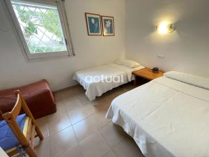 Posteľ alebo postele v izbe v ubytovaní Casa Orquidias 27