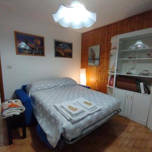 Postel nebo postele na pokoji v ubytování residenza " Il Gufetto"