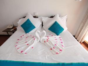 Postel nebo postele na pokoji v ubytování Closenberg Hotel