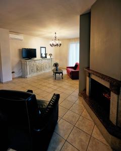 TV a/nebo společenská místnost v ubytování The Vintage House in San Giovanni Rotondo