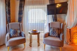 Posezení v ubytování Kasr-ı Kapadokya Cave Suites