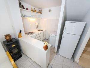 Kuchyň nebo kuchyňský kout v ubytování Shisha Stone House