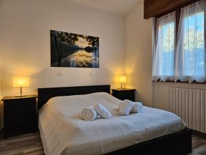 Postel nebo postele na pokoji v ubytování Casa di Carlo