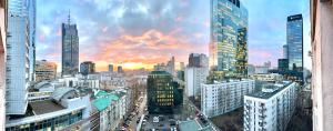 a view of a city skyline with skyscrapers at Intercontinental Escape in Warsaw