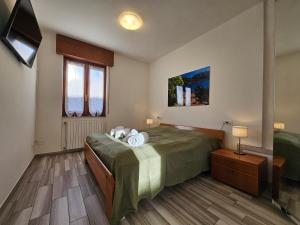 Postel nebo postele na pokoji v ubytování Casa di Carlo
