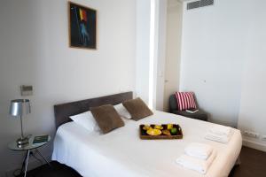 Katil atau katil-katil dalam bilik di Palais Miramar apartment with sea view on La Croisette