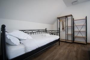 Postel nebo postele na pokoji v ubytování Grande maison de vacances L'Orée des Vignes