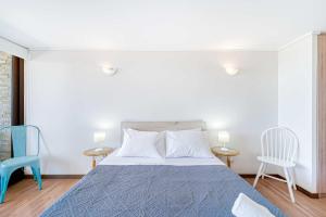 Letto o letti in una camera di Oceana Suite - Frente al Mar