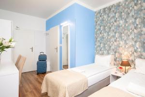 Posteľ alebo postele v izbe v ubytovaní Premium Hostel