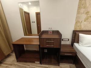 Swet Palash Resort客房内的一张或多张床位