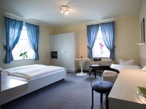 Postel nebo postele na pokoji v ubytování Pension Lausitz