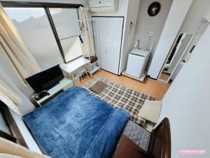 TV a/nebo společenská místnost v ubytování Kawaguchi house