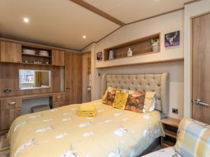 Voodi või voodid majutusasutuse Chalet Cairn View by Interhome toas