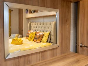 Voodi või voodid majutusasutuse Chalet Cairn View by Interhome toas