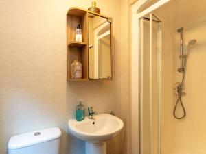 Vannituba majutusasutuses Chalet Cairn View by Interhome
