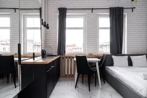 Posteľ alebo postele v izbe v ubytovaní RentPlanet - Studio Ruska
