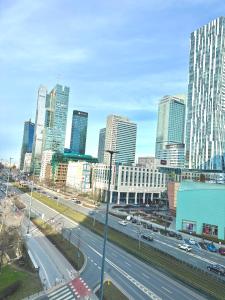 a view of a city with a highway and buildings at Central Warsaw Gem in Warsaw