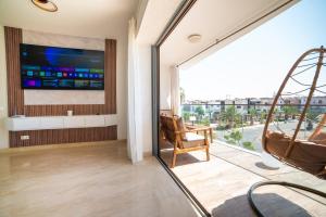 TV a/nebo společenská místnost v ubytování Appartement Premium Agadir Bay