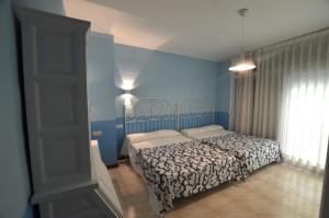 Posteľ alebo postele v izbe v ubytovaní Apartamento centro de Lloret 8 people