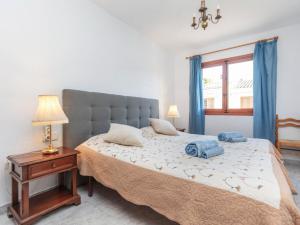 Posteľ alebo postele v izbe v ubytovaní Holiday Home Jorge Comin by Interhome