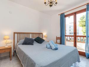 Posteľ alebo postele v izbe v ubytovaní Holiday Home Jorge Comin by Interhome