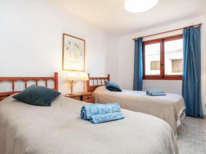 Posteľ alebo postele v izbe v ubytovaní Holiday Home Jorge Comin by Interhome